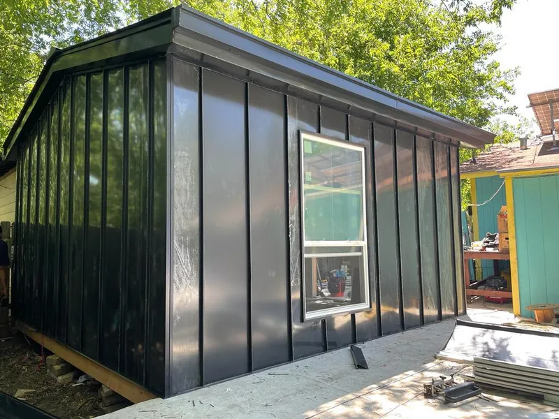 Black standing seam metal wall panels for Metal Roof Installation in New York